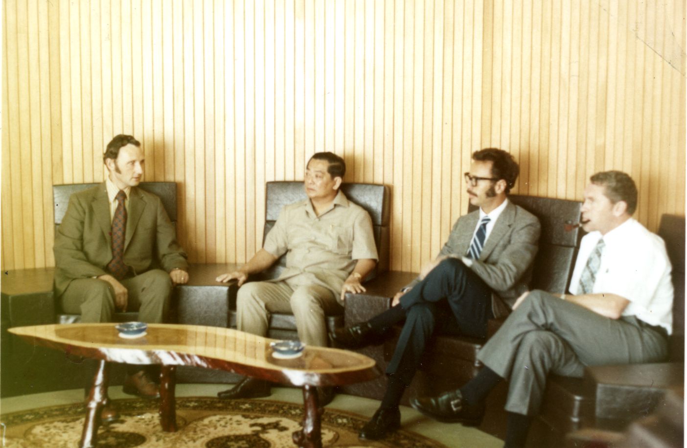 Intel representatives meeting with Dr. Lim of the Penang Development Corp., 1972. From left: Keith Thomson, Dr. Lim, Andy Grove, Lou Ross. 
