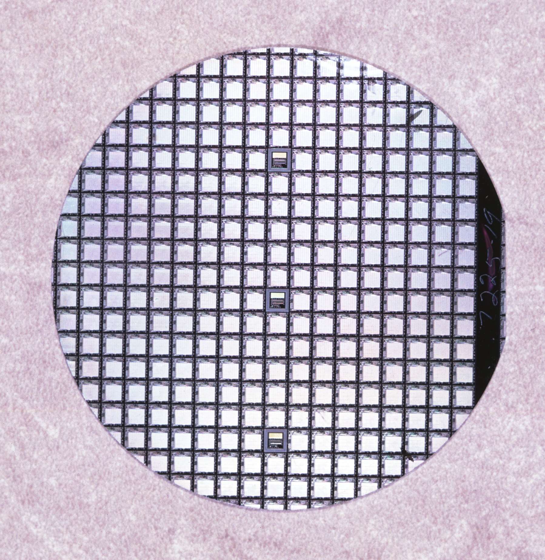 Each square on this 2-inch wafer represents a complete 1101 SRAM chip. 
